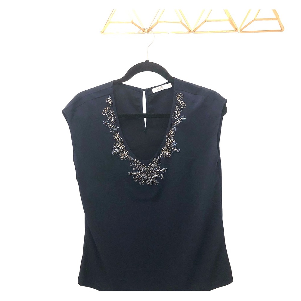 Dahlia navy blouse with beaded neck